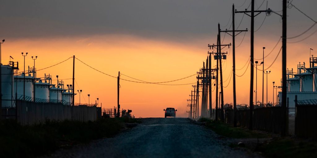 Oil prices post first loss in 5 sessions as U.S. crude supplies fall less than expected, Fed hikes rates