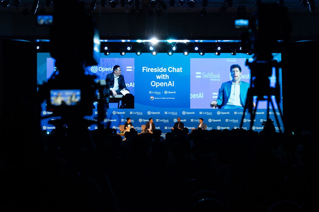 Kyunghyun Cho, professor of computer science and data science at New York University, from left, JP Lee, chief executive officer of Softbank Ventures Asia, Greg Brockman, president and co-founder of OpenAI, and Sam Altman, chief executive officer of OpenAI, during a fireside chat organized by Softbank Ventures Asia in Seoul, South Korea, on Friday, June 9, 2023. OpenAI is focused on building a better, faster and cheaper model of its generative AI ChatGPT product, Altman has said previously. The product made AI a buzzword and kicked off a global race among tech companies to build their own versions of the chatbot technology.