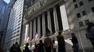 Dow closes up more than 510 points to kick off a busy week for the US economy