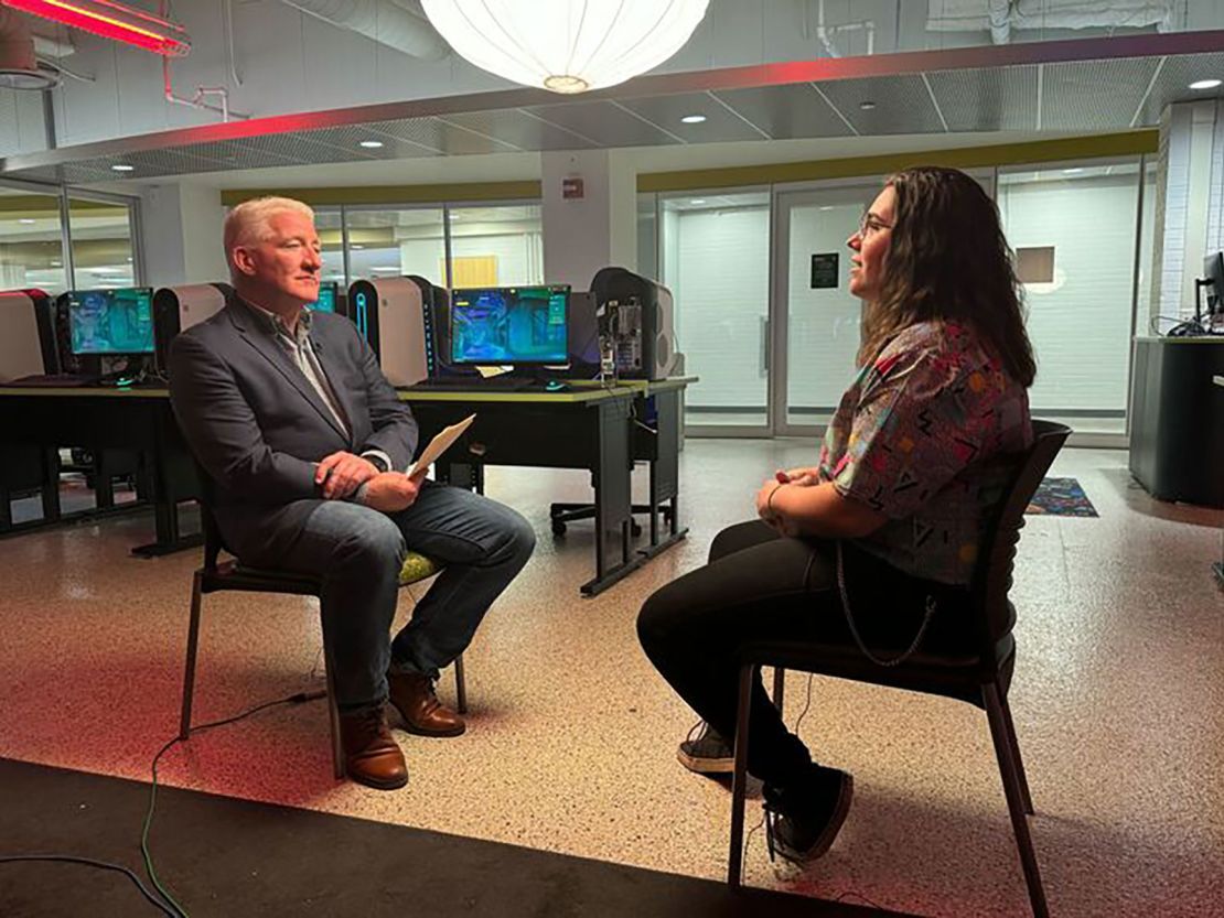 John King talks to Wayne State University student Summer Matkin in Detroit, Michigan.